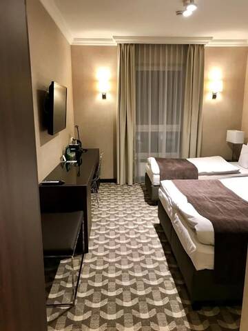 Фото номера Стандартный трехместный номер Отель Hotel Mansor г. Зомбки 2